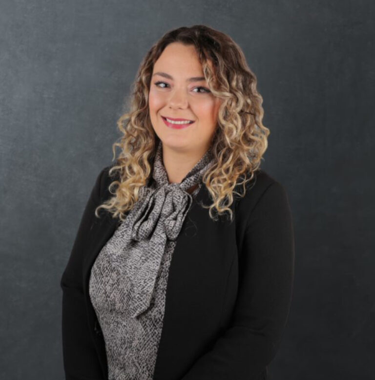 A photo of Ilayda, a senior paralegal at the Manchester office of Axis Solicitors.