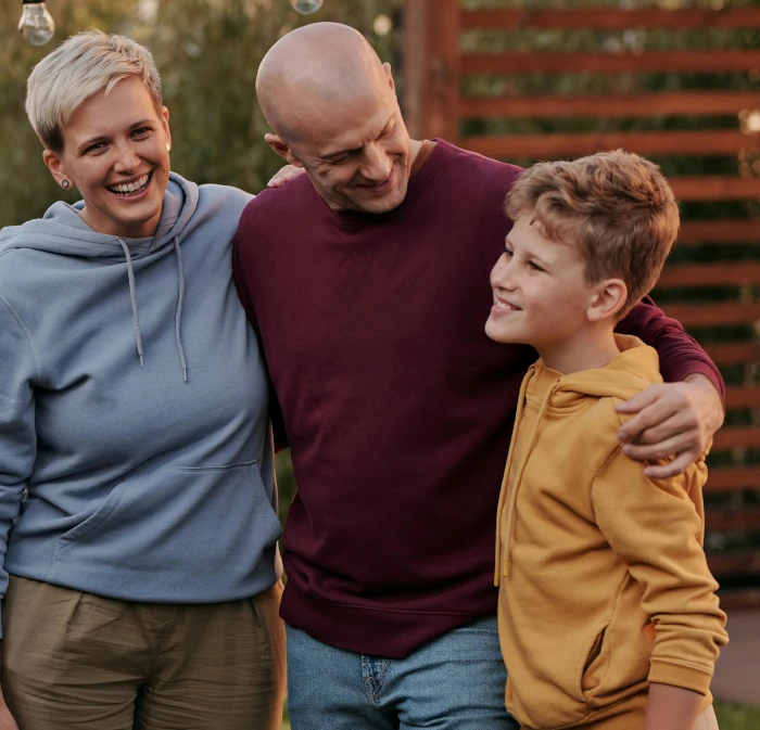 A photo of a family happily reunited after a successful Child Arrangement Order application in Birmingham.