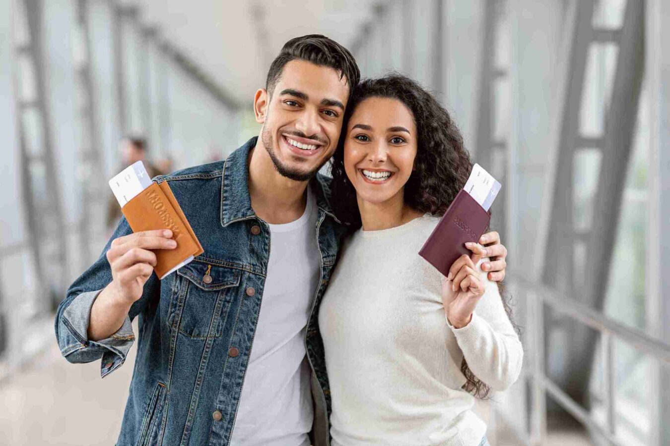 happy travellers young arab couple with passports
