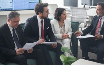 (In the image a discussion between solicitors regarding Group litigation orders can be seen)