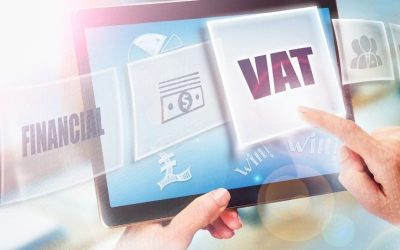 (In the image a businessman can be seen paying VAT in pounds)