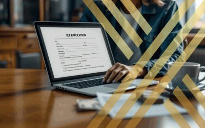 A casually dressed individual is seated at a lawyer's chamber, focused on writing an ILR application.