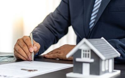 (In the image a solicitor can be seen working on a local property dispute case)