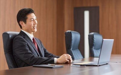 (In the image a solicitor can be seen participating in a remote hearing)