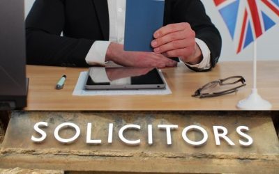 (In the image a business immigration solicitor can be seen approving a visa)