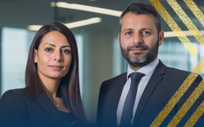 Photo of two solicitors at Axis Solicitors explaining how to apply for leave to remain as a spouse.